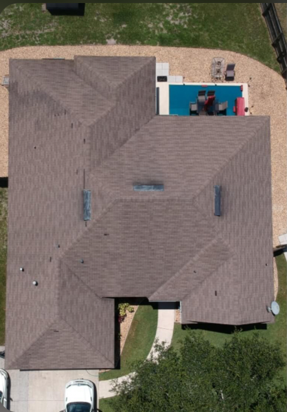 Aerial view - brown shingle roof with pool