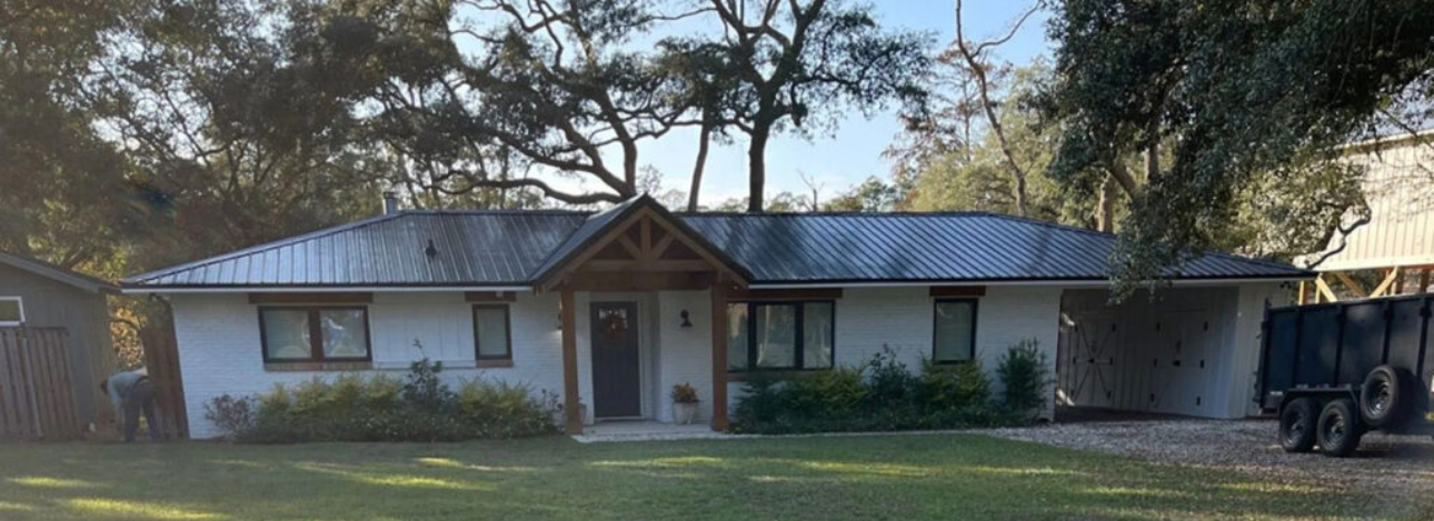 Ranch home with new standing seam metal roof