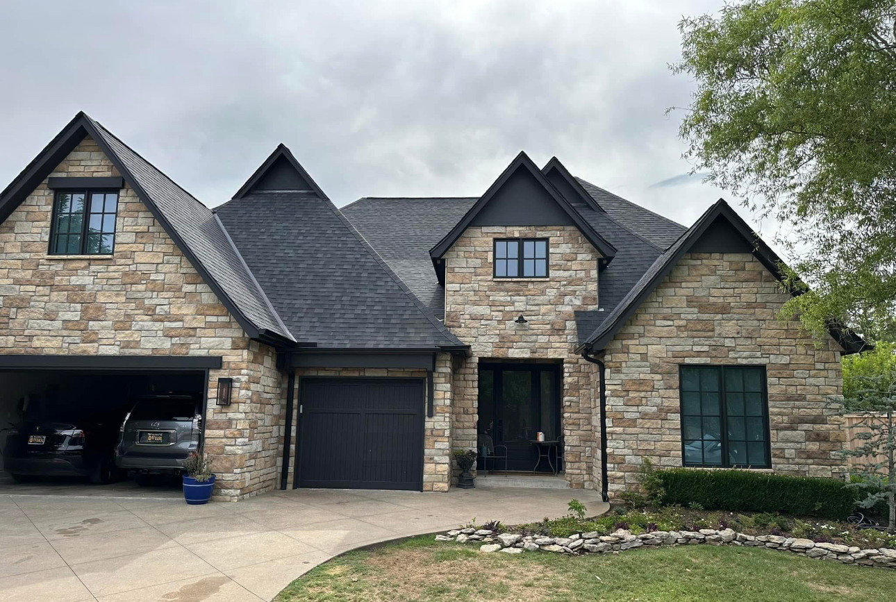 Completed dark shingle roof - front view