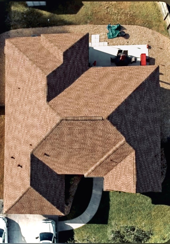 Aerial view - completed multi-hip shingle roof