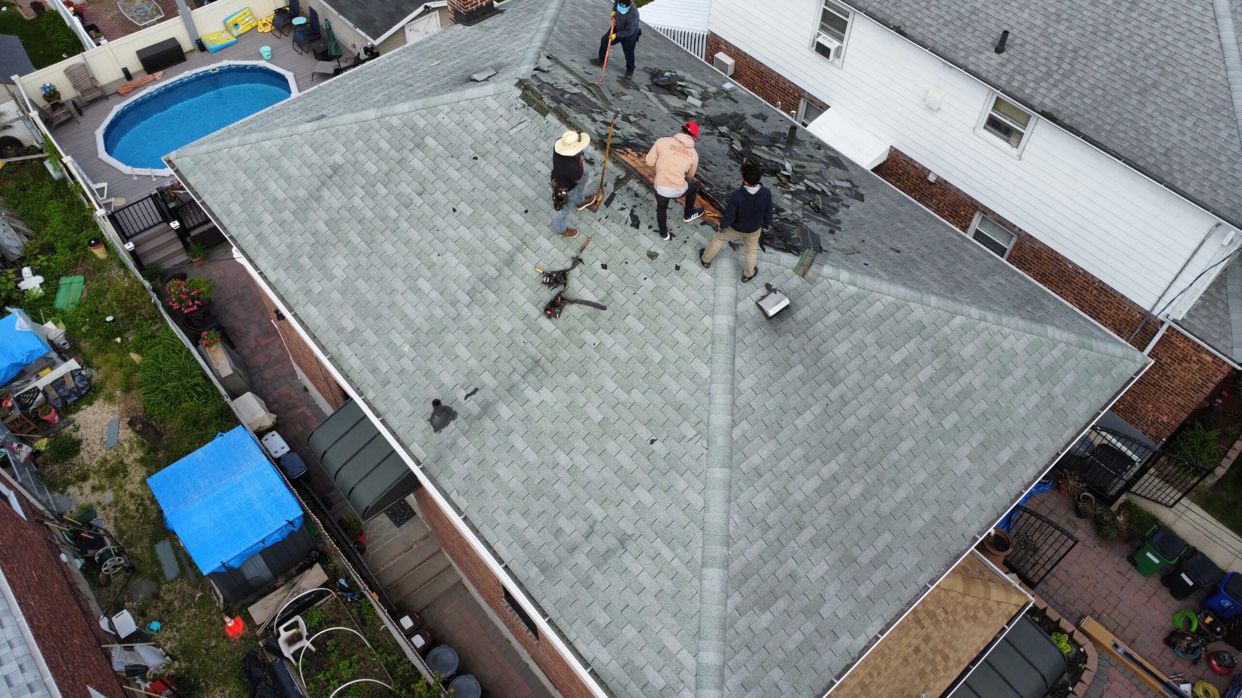 Roofing project - shingle tear-off in progress